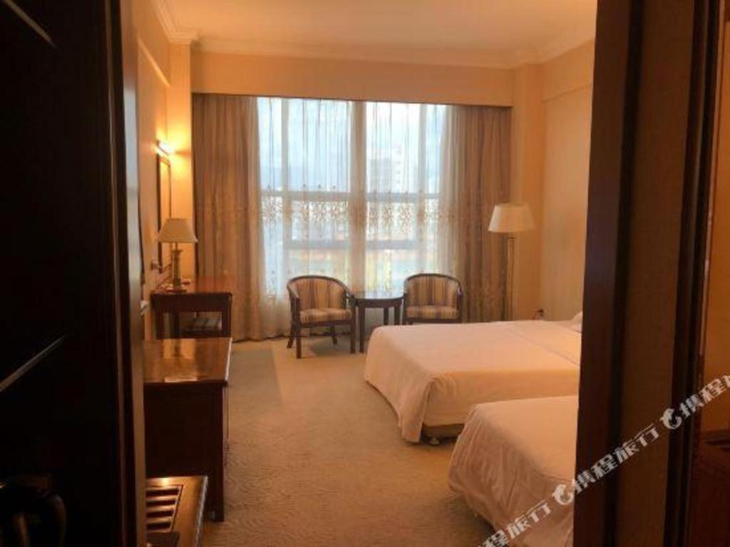 Fenggang Gladden Hotel Tiantangwei Exterior foto