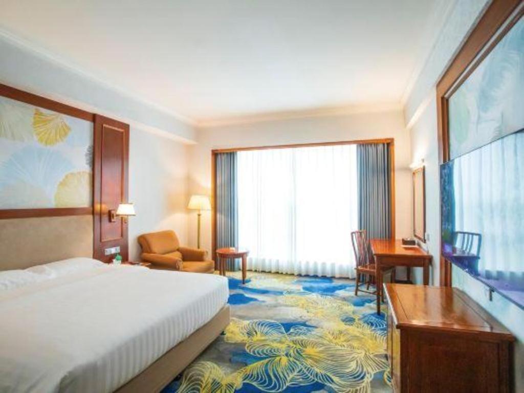 Fenggang Gladden Hotel Tiantangwei Exterior foto