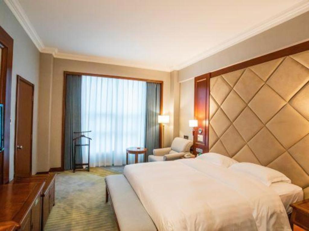 Fenggang Gladden Hotel Tiantangwei Exterior foto