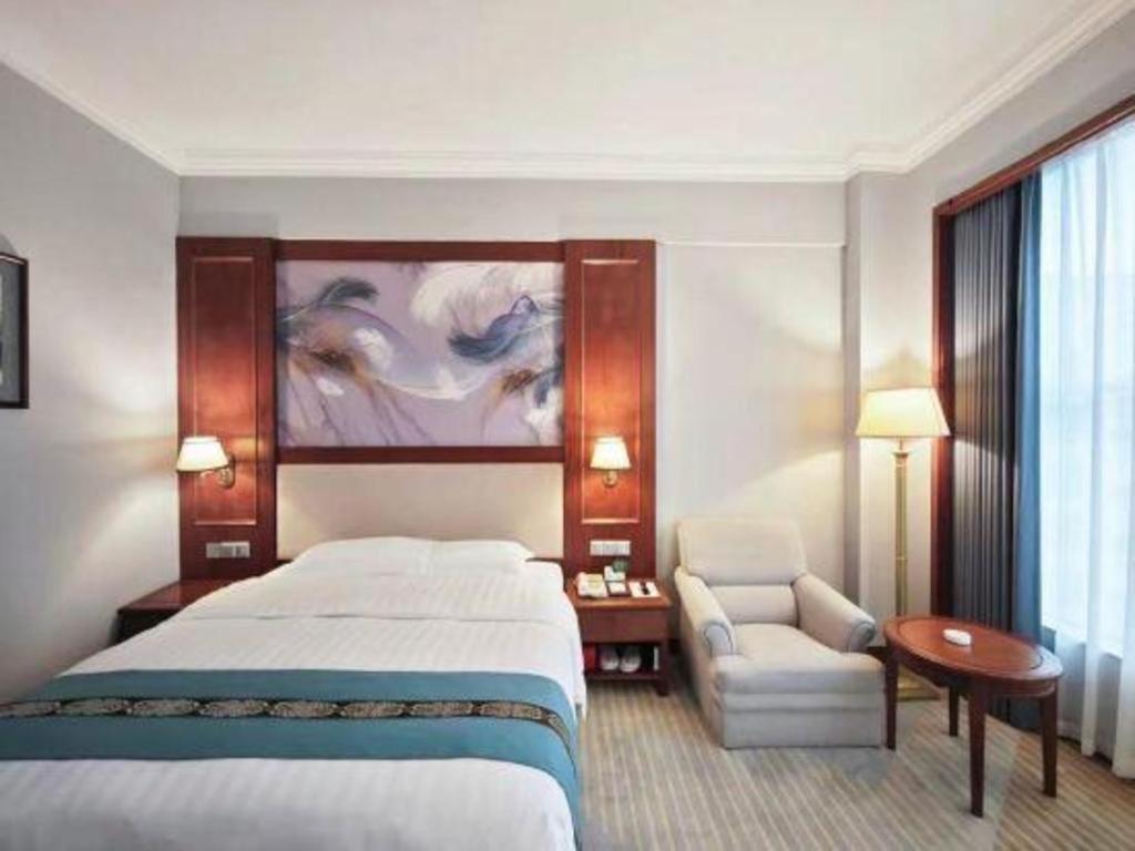 Fenggang Gladden Hotel Tiantangwei Exterior foto